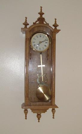 The design for this clock came from a book - which did not quite give enough information or detail to fully make it! I had to work out quite a few of the details. Sourcing the lyre attachment on the pendulum took a while - what a wonderful thing the internet is! The movement is battery powered since the case is too small for a regulator or spring movement. My son liked it so much I made another one for him.