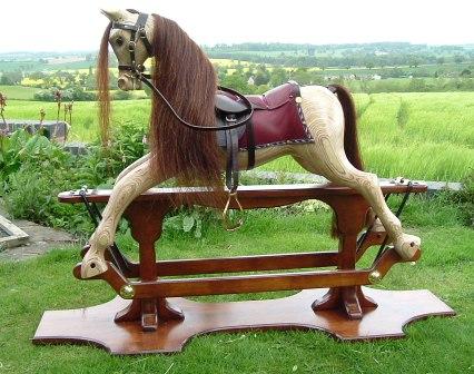 After the constuction toys I moved on to rocking horses - starting with this striking laminated one designed by Judy Fergusson. Made from Birch ply and carved largely with a Powerfile this was a dusty and noisy introduction to carving but the result was satisfying.