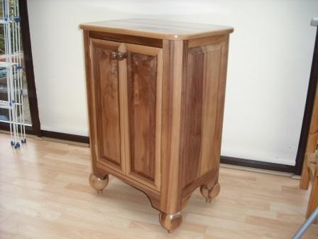 My own designs started to get a fair bit more complicated with this shoe cabinet made from solid Walnut. Another first - this time making fielded panels. The cabinet is finished with french polish - lots of coats.