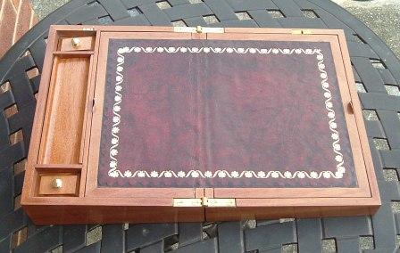 The writing slope design came from an old woodworking magazine. It is essentially a router project which required me to make a router table to be able to make the slope.